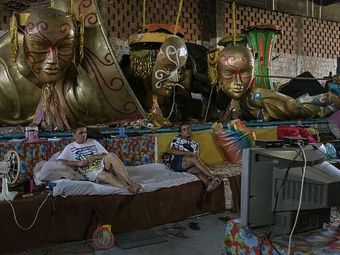 Previous carnival parade floats at the Inocentes de Belford Roxo samba school in Rio de Janeiro, Feb. 14, 2021. Brazil's most famous Carnival has endured years of war, hyperinflation and despotism. But with a pandemic raging, the party is cancelled. 