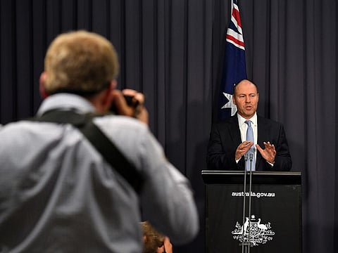 Australia's Treasurer Josh Frydenberg speaks at a news conference at Parliament House in Canberra, Australia, February 18, 2021. 