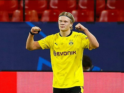 Borussia Dortmund's Erling Braut Haaland celebrates scoring their third goal.