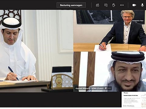 Sewa and Dutch Bundera officials remotely sign the agreement.