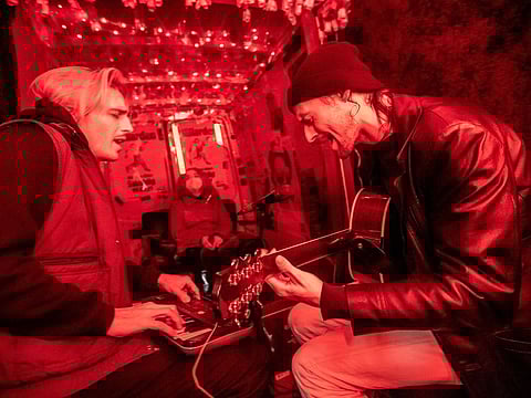 German rock band "Milliarden" (Billions) gives a concert in a van for a single fan separated by a plexiglass pane in Berlin.
