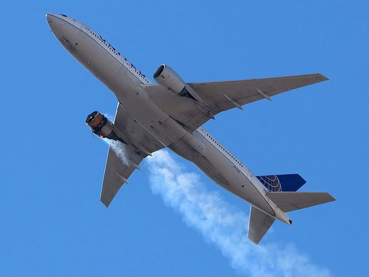 United Airlines flight UA328, carrying 231 passengers and 10 crew on board, returns to Denver International Airport with its starboard engine on fire after it called a Mayday alert, over Denver, Colorado. 