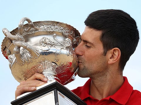 Novak Djokovic with the Australian Open trophy