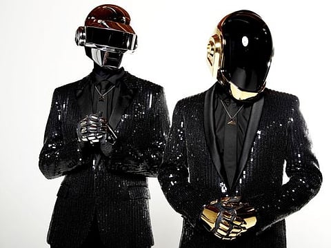 Thomas Bangalter, left, and Guy-Manuel de Homem-Christo, from the music group, Daft Punk, pose for a portrait in Los Angeles. The Grammy-winning French act have announced their break up.