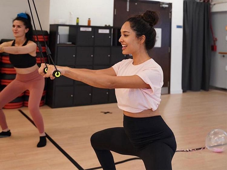 Actress Lisa Haydon works out at her friend's baby shower