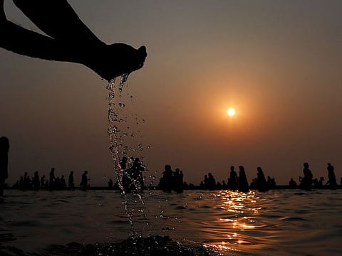 Photos: Hindu festival draws crowds to holy river
