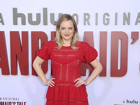 Elisabeth Moss attends the "The Handmaid's Tale" season three finale red carpet at the Regency Village Theatre on Tuesday, Aug. 6, 2019, in Los Angeles.