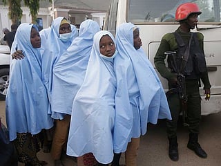 Some of the students who were abducted by gunmen from the Government Girls Secondary School, in Jangebe, last week wait for a medical checkup after their release meeting with the state Governor Bello Matawalle, in Gusau, northern Nigeria, Tuesday, March 2, 2021. 