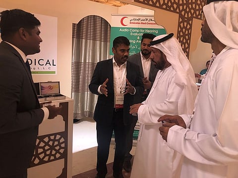 Rashid Mubarak Al Mansouri, Deputy Secretary General for Local Affairs, Emirates Red Crescent, seen interacting with Abdul Jaleel Eramangalath, MD, Faith Medical