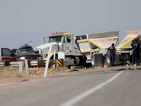 A collision between a truck and an SUV carrying more than two dozen people near the US-Mexico border Tuesday morning has left 13 dead and several others injured on Tuesday, Mar. 2, 2021, in Holtville, California.