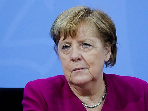 German Chancellor Angela Merkel attends a news conference with Bavarian state governor Markus Soeder and the Mayor of Berlin Michael Mueller after a meeting at the chancellery in Berlin, Germany, Tuesday, March 3, 2021.