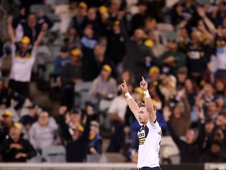 Ryan Lonergan celebrates his winning kick for Brumbies