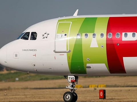 A TAP Air Portugal plane taxis at Lisbon's airport during the coronavirus disease (COVID-19) outbreak, in Lisbon, Portugal.