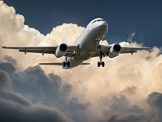 Man attempts to open emergency exit twice on flight to Sydney, arrested
