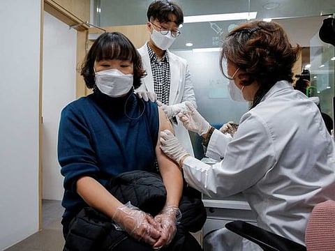 A nursing home worker receives the AstraZeneca COVID-19 vaccine at a health care centre as South Korea starts a vaccination campaign against the coronavirus disease (COVID-19), in Seoul, South Korea February 26, 2021. 