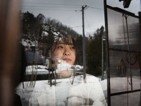 Rina Tsugawa, in the house where she grew up in Fukushima Prefecture in Japan on Saturday, March 6, 2021. 