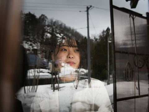 Rina Tsugawa, in the house where she grew up in Fukushima Prefecture in Japan on Saturday, March 6, 2021. 