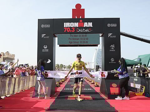 Denmark’s Daniel Bakkegard lowered a course record to win the men's crown in Ironman 70.3 on Friday.