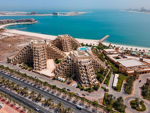 Own property through a Ras Al Khaimah ICC registered corporate entity. 