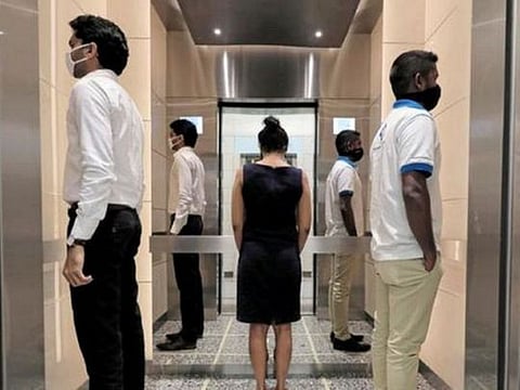 COVID-19: Why you should stop talking in elevators
