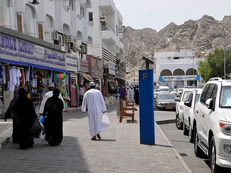 Stock Oman Muscat skyline people