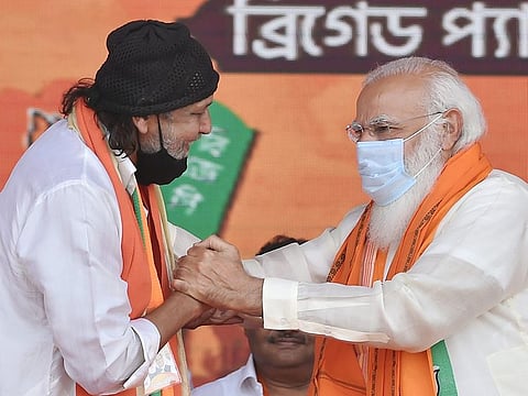Mithun Chakraborty (left), the Bollywood legend, receives a warm welcome from Indian Prime Minister Narendra Modi after the former joined the BJP on March 7.