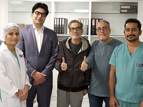 Ashraf Ali Abdul Mohsin (centre) with the medical team that saved his life at Canadian Specialty Hospital, Dubai 