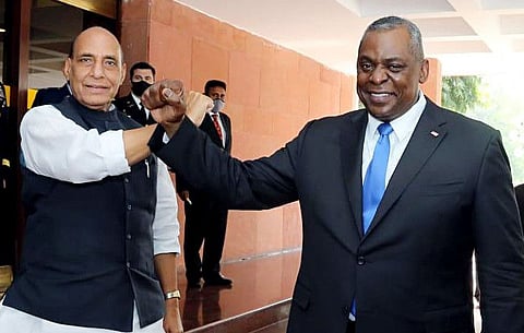Defence Minister Rajnath Singh and US Defence Secretary Lloyd J Austin III greet each other with an elbow bump, in New Delhi on Saturday. 