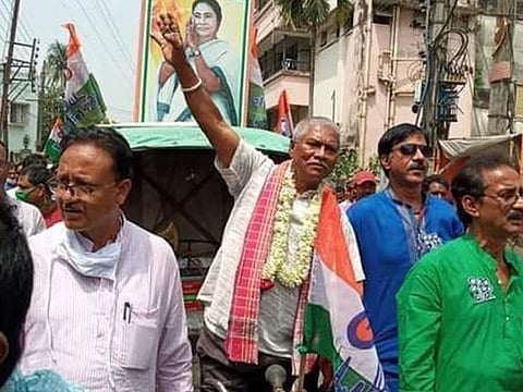 An unusual politician: Manoranjan Byapari pulls a cycle rickshaw, an indigeous public vehicle in India - on his way to submitting his nomination papers for the elections.