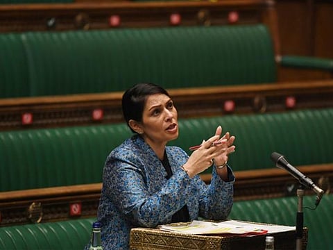 Britain's Home Secretary Priti Patel speaks during a parliament session at the House of Commons in London. More than 60 British lawmakers have written to her calling for protests to be allowed in England during lockdown. 