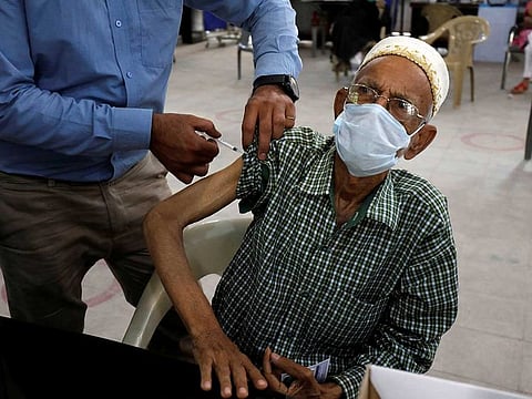 A resident receives a dose of COVID-19 vaccine at a vaccination centre in Karachi, Pakistan March 22, 2021. 