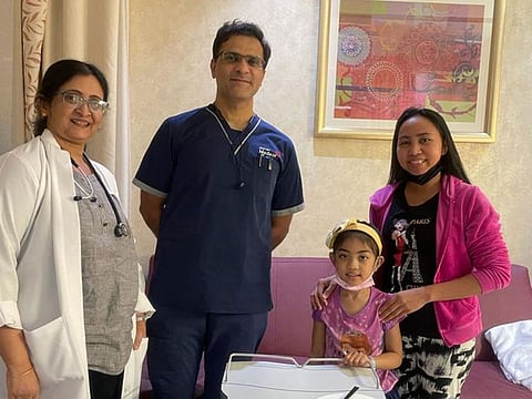 Althea Faye Barbacina with her mother and the doctors who saved her at the Medeor Hospital in Dubai