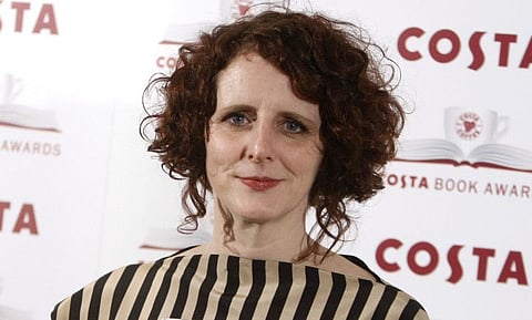 Author Maggie O'Farrell poses for the media at the Costa book awards in London on Jan. 25, 2011. O'Farrell's "Hamnet," an imagined take on the death of Shakespeare's son from the bubonic plague, has won the National Book Critics Circle prize for fiction.