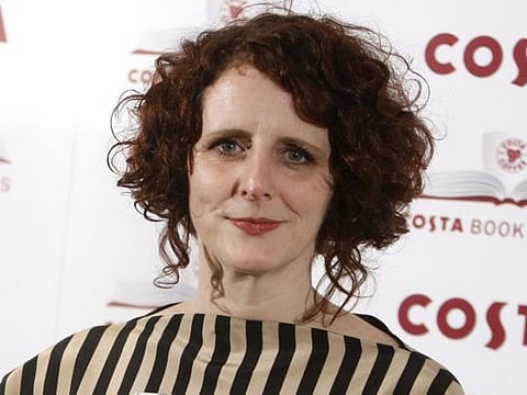 Author Maggie O'Farrell poses for the media at the Costa book awards in London on Jan. 25, 2011. O'Farrell's "Hamnet," an imagined take on the death of Shakespeare's son from the bubonic plague, has won the National Book Critics Circle prize for fiction.