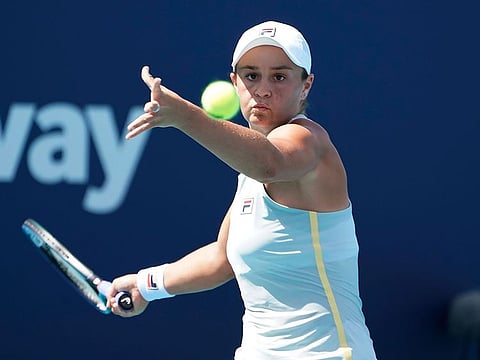 Ashleigh Barty of Australia returns to Jelena Ostapenko of Latvia, during the Miami Open 