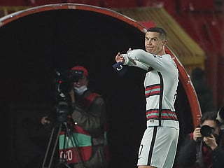 Cristiano Ronaldo throws captain's armband during Fifa World Cup 2022 qualifier between Portugal and Serbia.