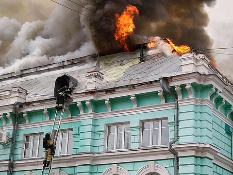 Firefighters extinguish a fire that broke out at a cardiac surgery centre in Blagoveshchensk, in Russia's Far East, on April 2, 2021.