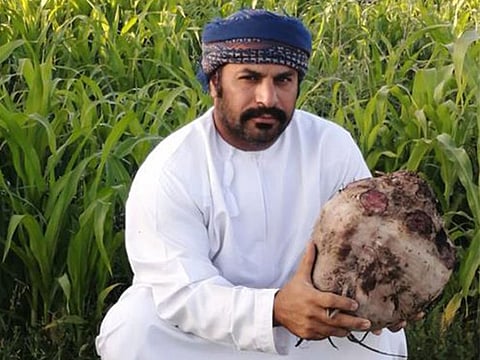 Khalid bin Hilal Al-Hajji with the 8kg beetroot.