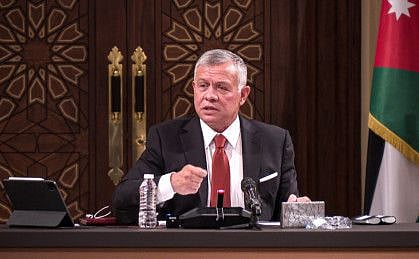 A handout picture released by the Jordanian Royal Palace on March 23, 2021 shows Jordanian King Abdullah II speaking during a meeting with the speaker and heads of a number of committees at the House of Representatives in the capital Amman. 