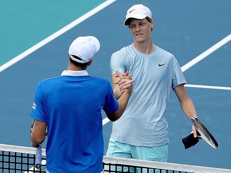 Hubert Hurkacz of Poland is congratulated by Jannik Sinner after the Miami Open final