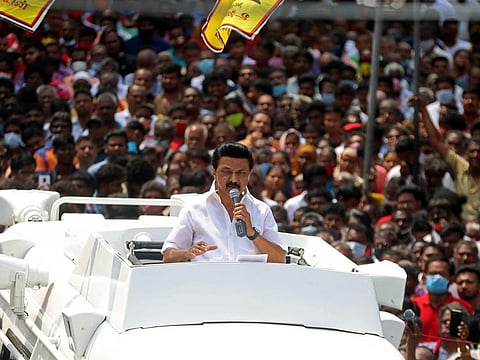 DMK Chief M.K. Stalin addresses during a roadshow ahead of the assembly elections, in Chennai on Sunday. 