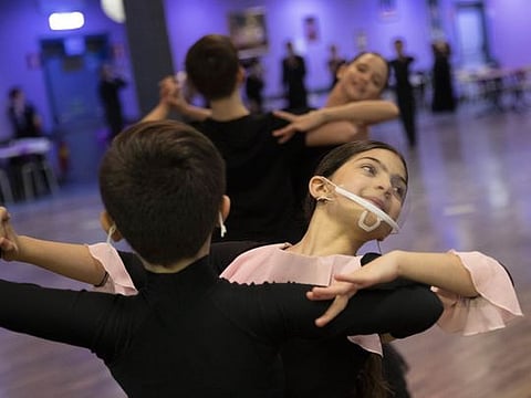 Photos: Italy ballroom dancers twirl through lockdown