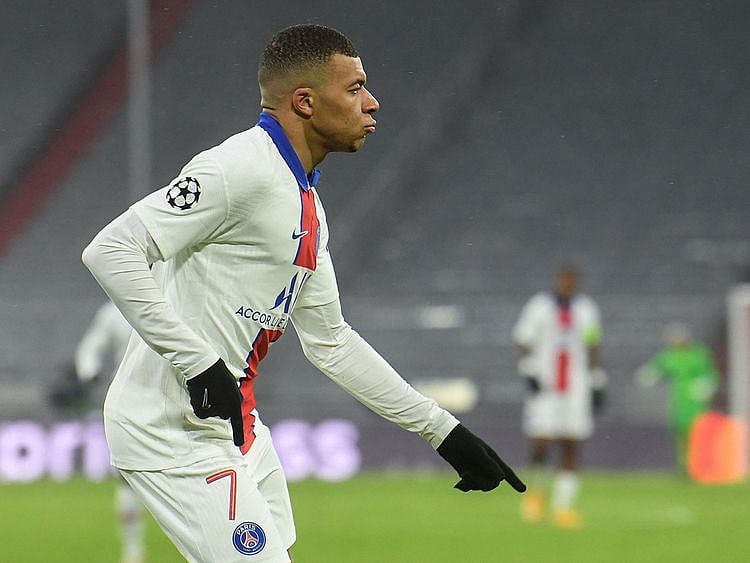  Paris St-Germain forward Kylian Mbappe celebrates scoring against Bayern Munich 