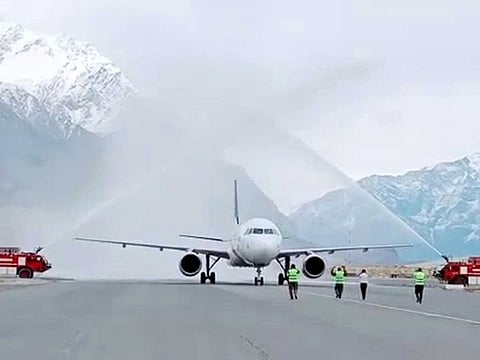 PIA flight receives a water salute at Skardu Airport on April 7, 2021. 