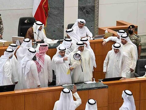 MP Mohammed Al Mutair used a megaphone to scream, “This vote will not pass.”