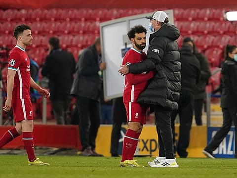 Jurgen Klopp consoles Mo Salah after Liverpool's loss to Real Madrid in Champions League