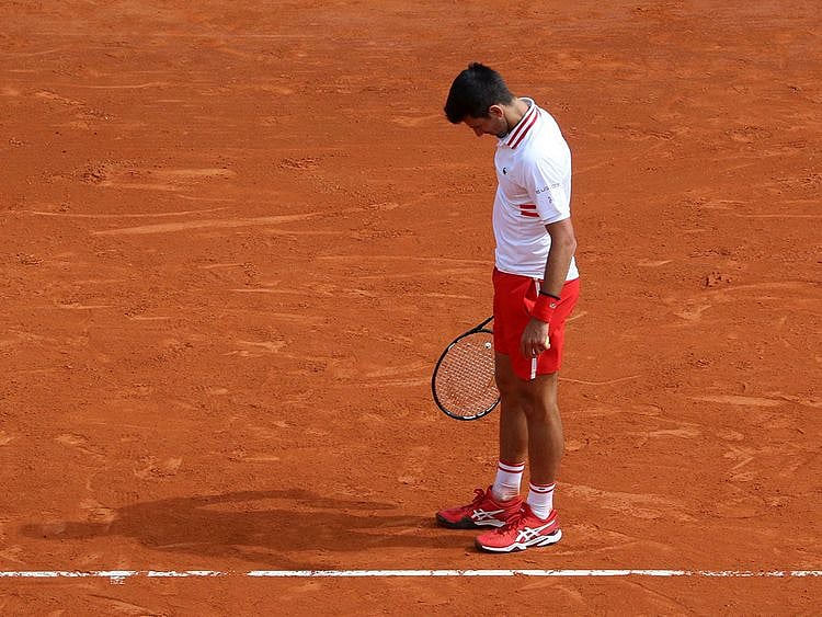 Serbia's Novak Djokovic was defeated by Dan Evans on day six of the Monte Carlo Masters