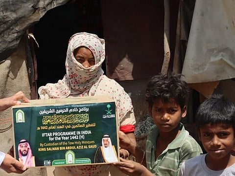 Saudi iftar food boxes are handed out in India.