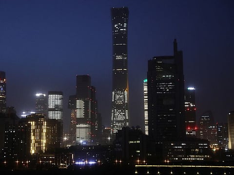 Buildings in the Central Business District (CBD) are seen lit up during the night in Beijing, China April 15, 2021. 