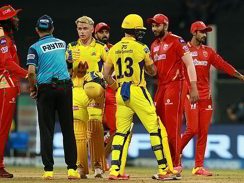 Chennai and Punjab players greet each other after the match.  